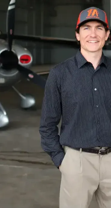 Wade Hartley, founder of Hartley Aerial, in an aircraft hangar